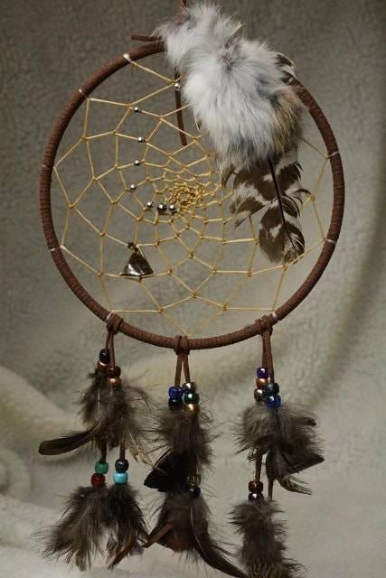 Dreamcatcher, full size, leather wrapped with feather and bead dangles and beaded webbing