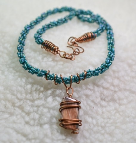 Green Spiral Bead Necklace with Copper Wire Wrapped Stone Pendant