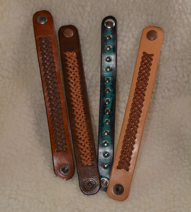 Group of 4 leather band bracelets - brown, dark brown, natural, turquoise/black
