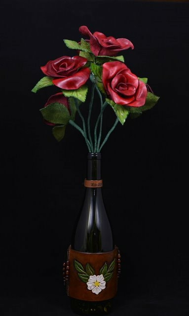 Red Leather Roses in Wine Bottle with Carved Wild Rose Leather Bottle Cover