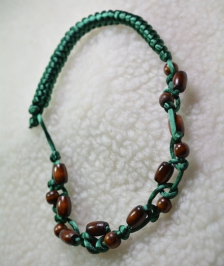 Green Satin Knotted Cord and Wood Bead Necklace